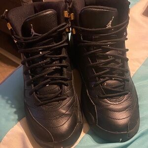 Black retro Jordan 12 size 5.5 big boy/7 women’s